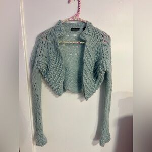 Moda international baby blue cropped bolero.